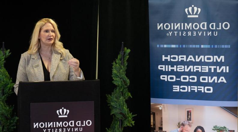 Woman speaking at podium